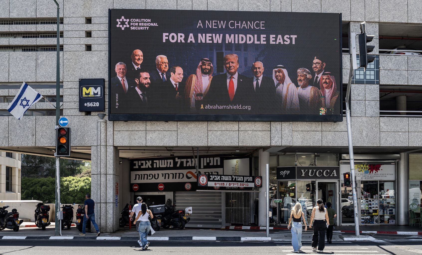 A poster depicting leaders of Saudi Arabia, Syria, Oman and Lebanon alongside President Donald Trump and Israeli Prime Minister Benjamin Netanyahu, in Tel Aviv, Israel, June 2025. (Mostafa Alkharouf/Anadolu via Getty Images)