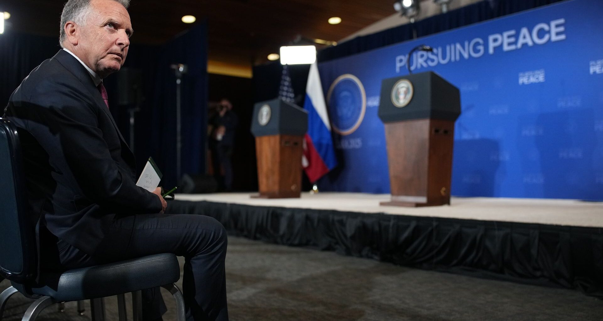 Photo for illustrative purposes: A Ukrainian woman displays her passport as she waits to cross the U.S.-Mexico border on April 5, 2022 in Tijuana, Mexico. (Mario Tama/Getty Images)