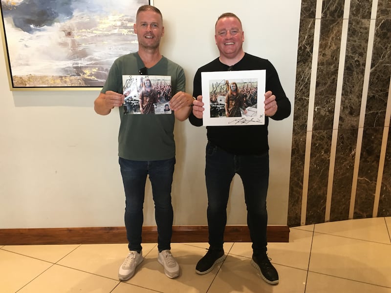 Gary Downes and Vinnie McConnell with their signed photographs. Photograph: Stephen Farrell