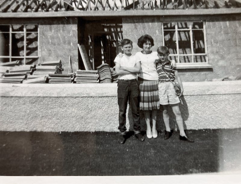 Philip Stephens with his  mother Teresa and brother Paul in Kiltimagh as one of the first bungalows in the Mayo town was being built in the 1960s