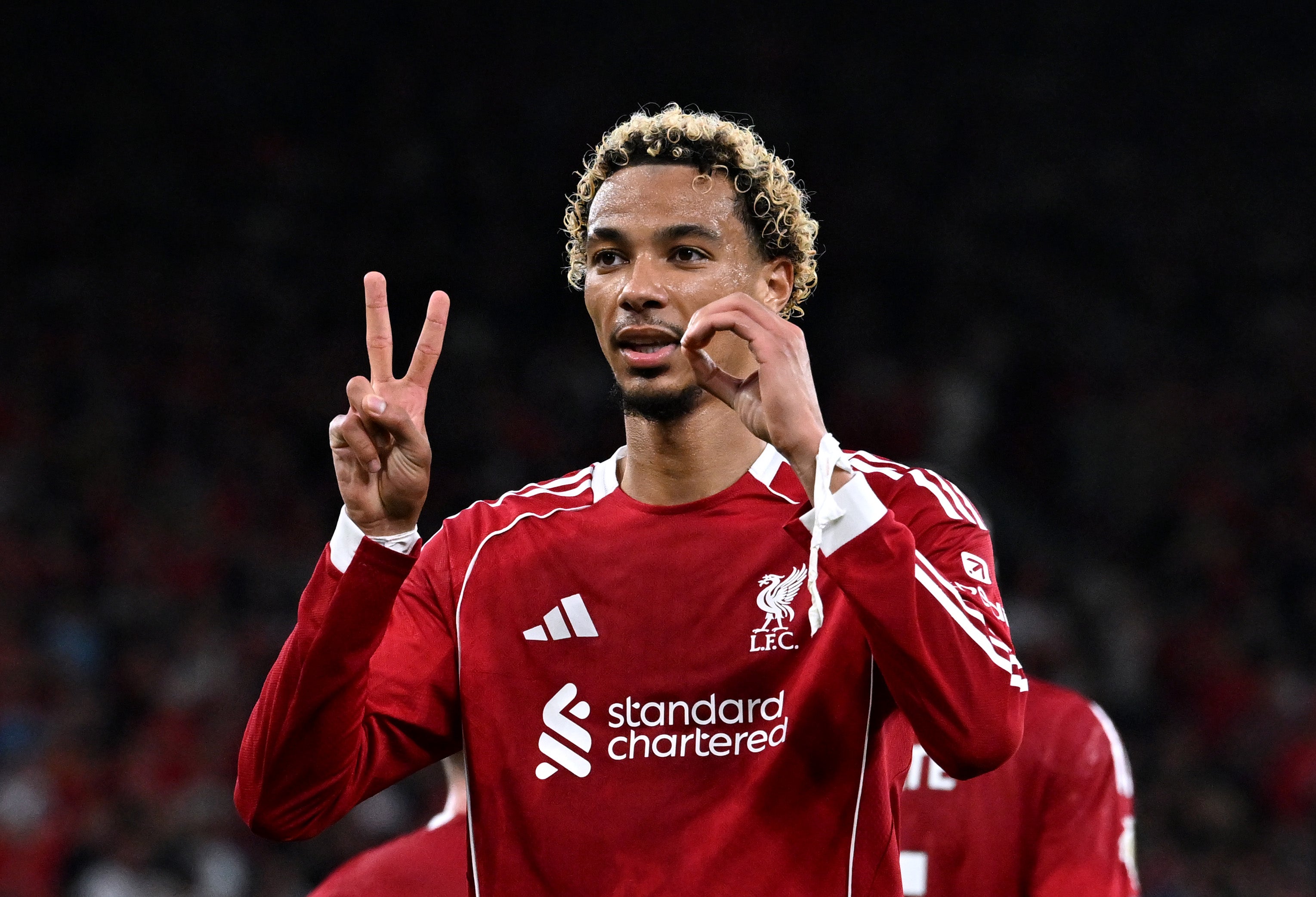 Ekitike celebrates with Diogo Jota’s No 20 after scoring Liverpool’s opener