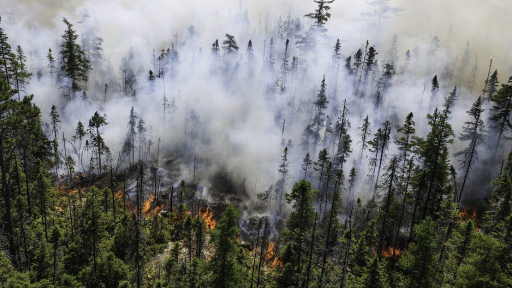 Smoke from the Long Lake wildfires complex billows into the air.