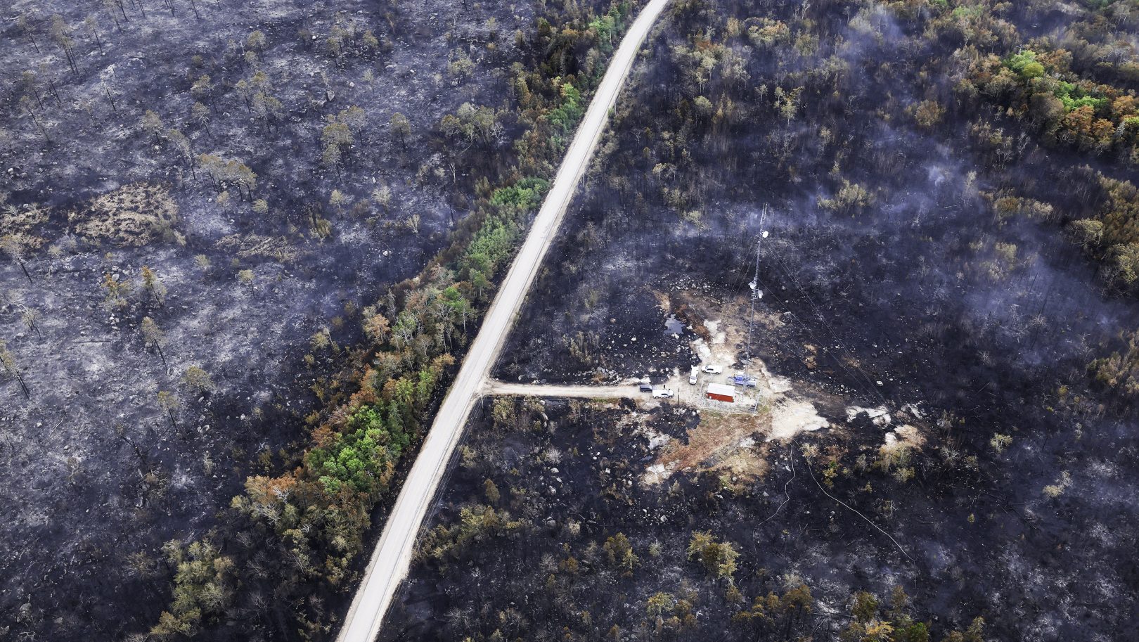 Crews protecting buildings from Long Lake wildfire