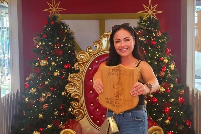 Julia Manktelow with the ‘Best Overall Float’ trophy in 2024. Photo/Supplied.