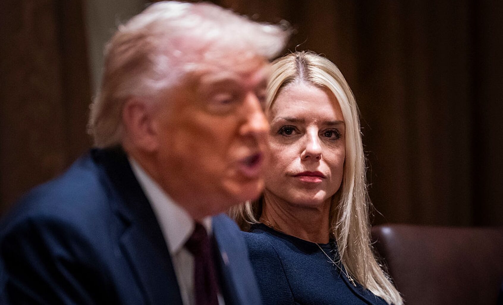 President Donald J Trump, flanked by Attorney General Pam Bondi, speaks during a cabinet meeting at the White House on Monday, March 24, 2025. (Jabin Botsford/The Washington Post via Getty Images)