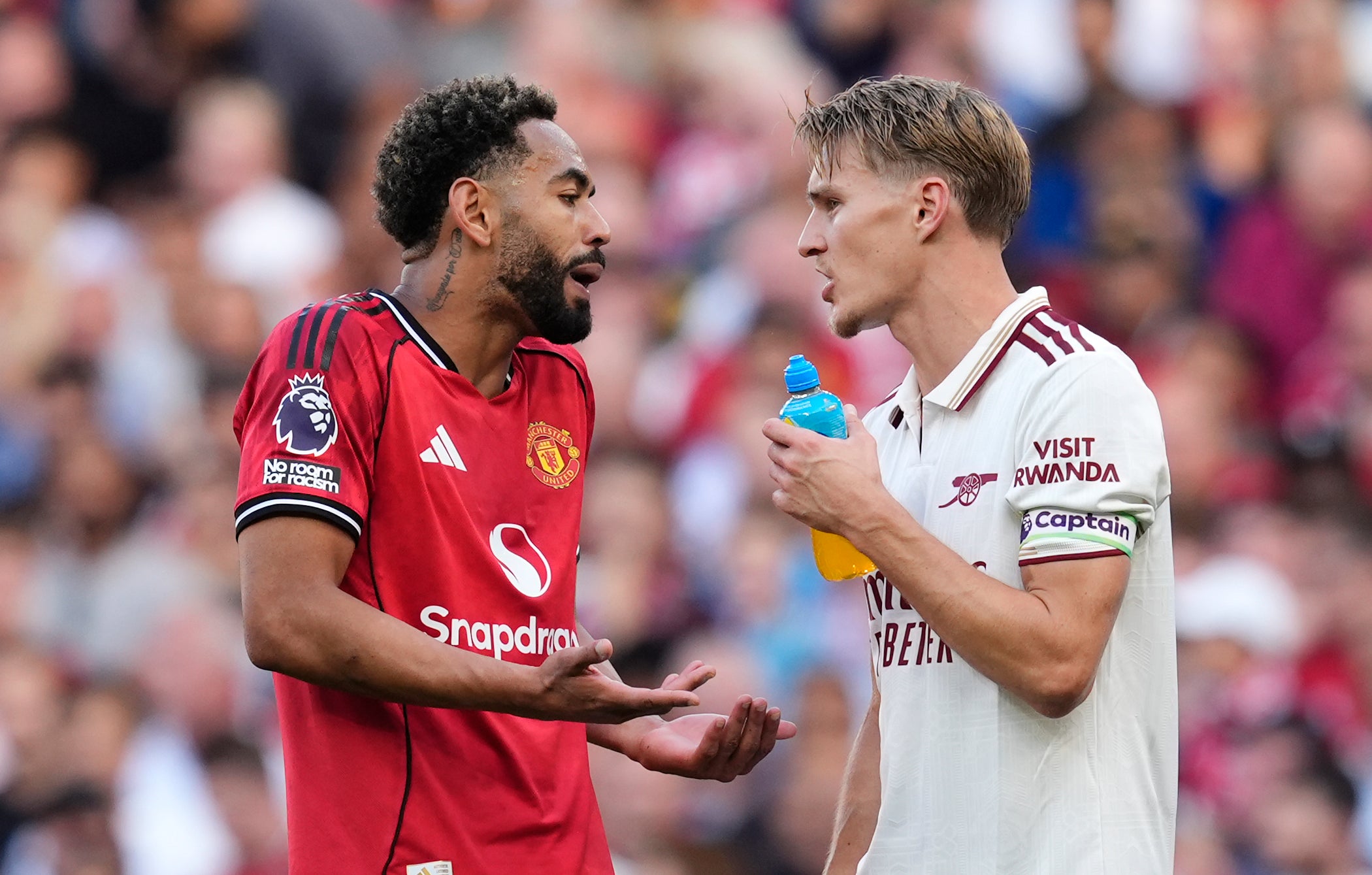 Cunha argues with Arsenal captain Martin Odegaard