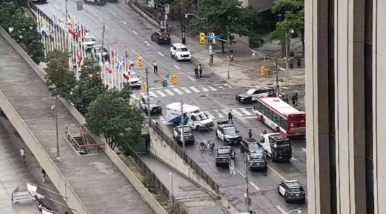 Toronto police cruiser hit head-on as vehicle strikes multiple parked cars downtown, male arrested