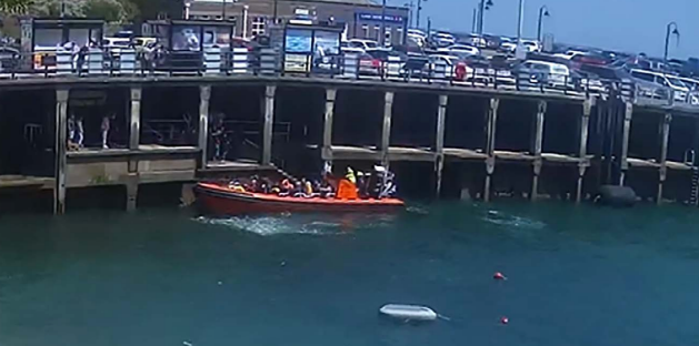 The Lundy Explorer pictured at pier landing stages about to disembark passengers
