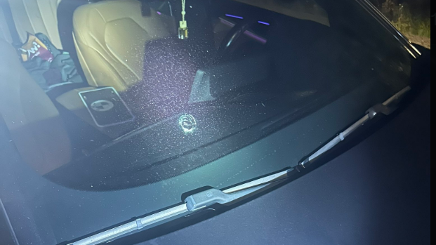 19-year-old caught street racing, strikes two officers