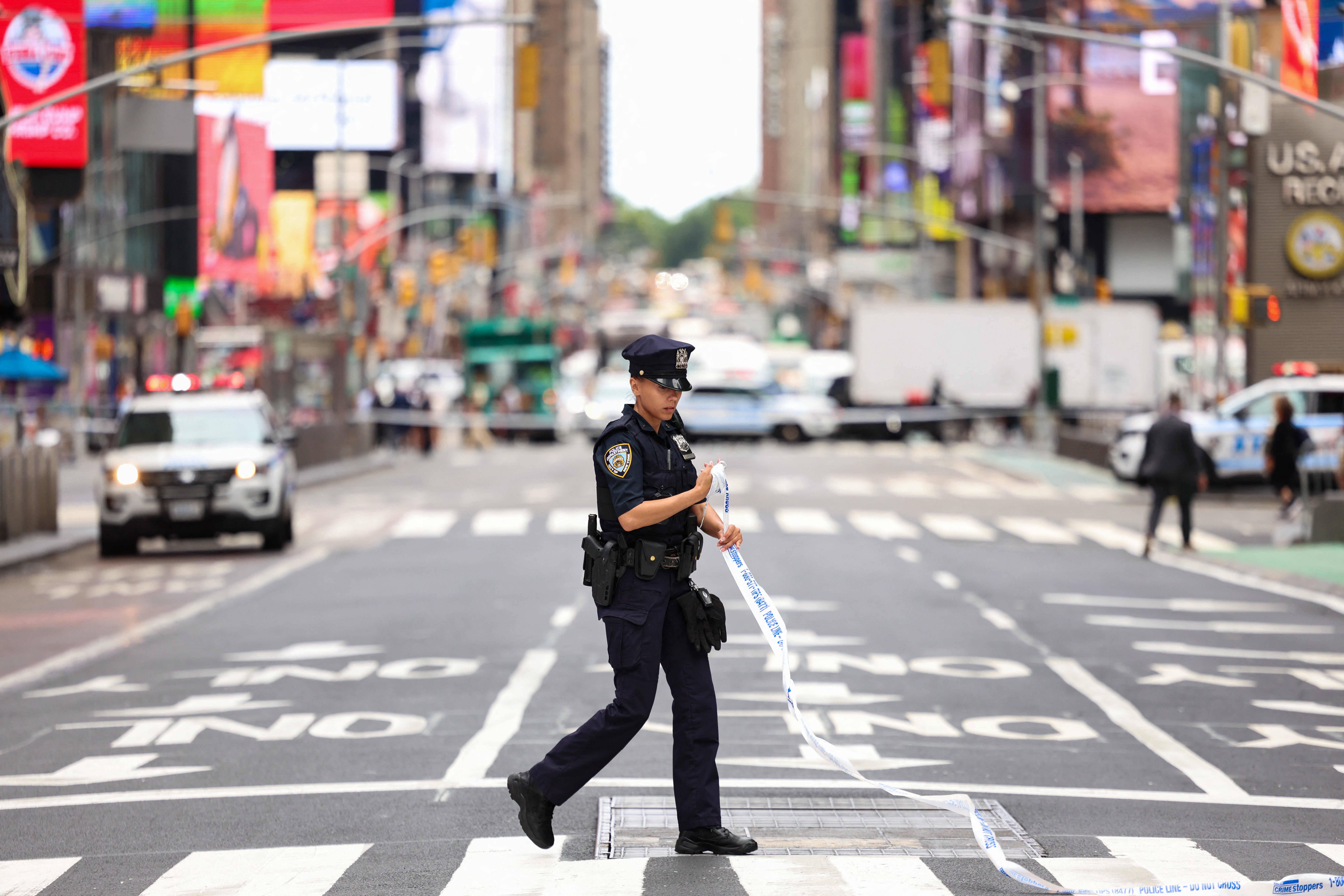 Authorities evacuated Times Square Monday morning after a suspicious package was found outside a nearby NYPD precinct.