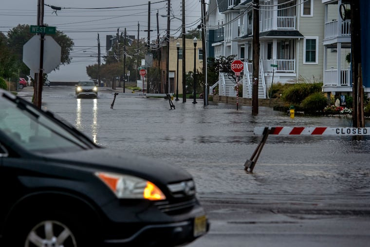 Some intersections are flooded as high tide arrives in Ocean City one evening in 2022.