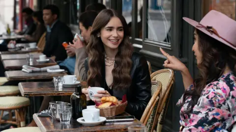 Alamy A picture of Lily Collins as Emily in Paris