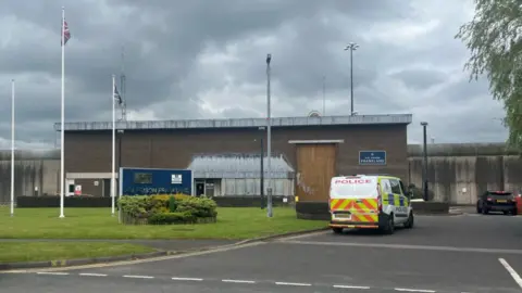 PA Media A general view of HMP Frankland jail with a police van outside