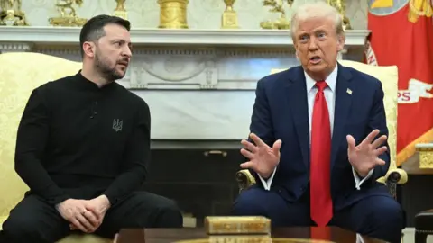 Getty Images US President Donald Trump and Ukraine's President Volodymyr Zelensky sitting side by side during a meeting in the Oval Office of the White House on February 28