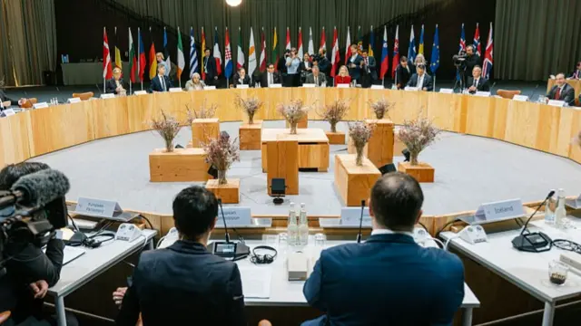 EU leaders in Copenhagen sat around a large circular set of tables.