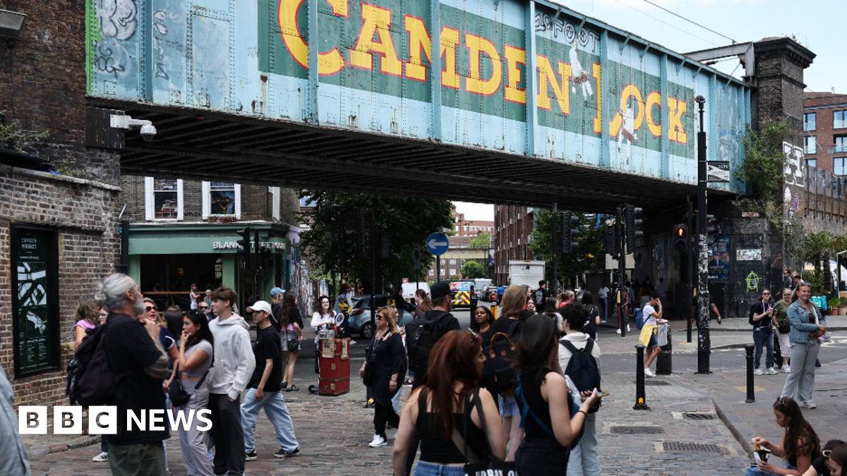 David Lochridge in a submersible looking out at an underwater reef