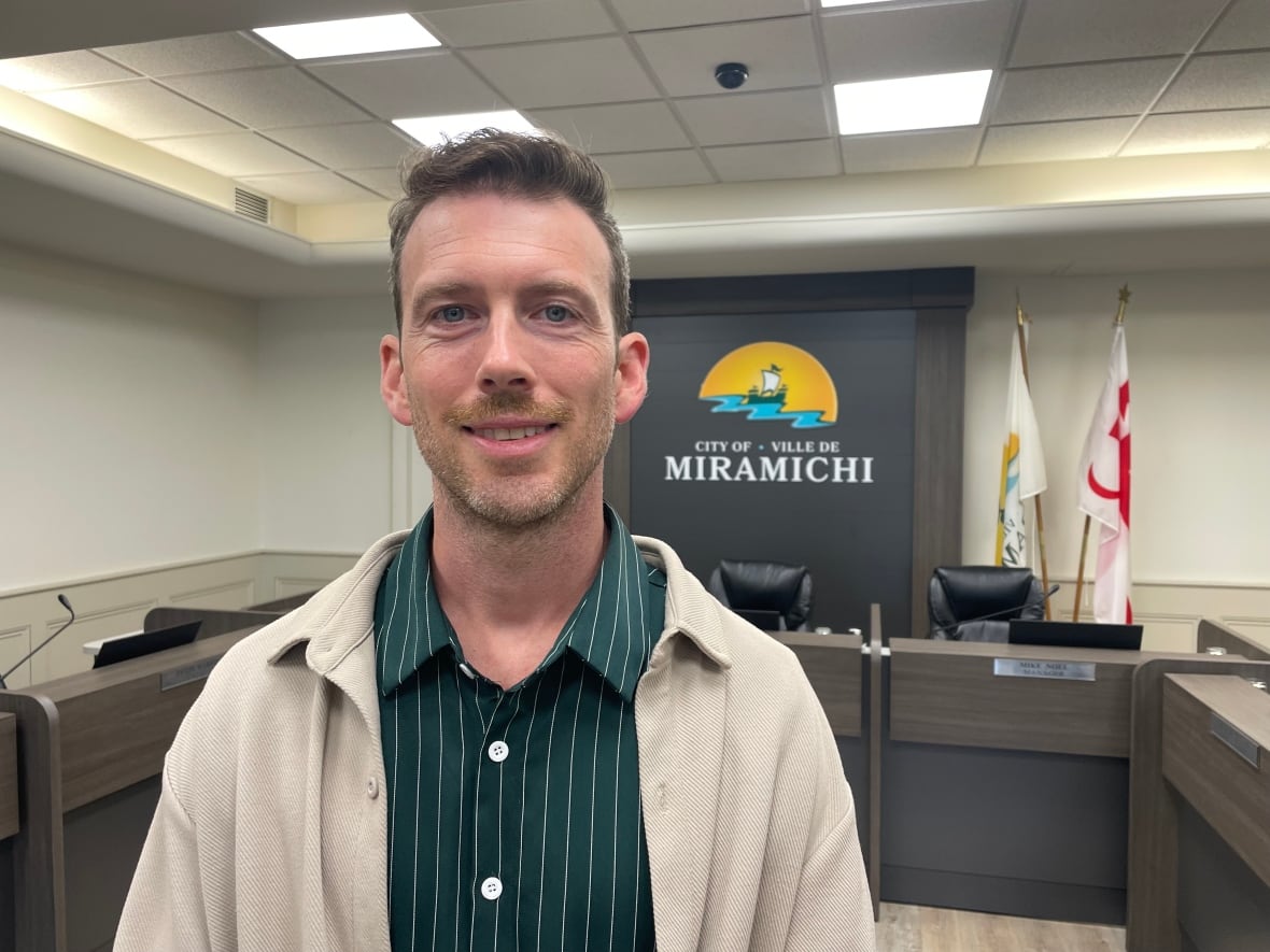 A man standing in a meeting room