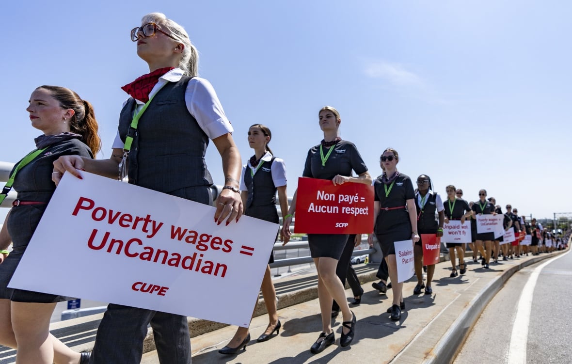 Air canada flight attendants march in montreal on aug 11
