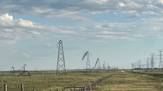 Severe thunderstorm in southern Alberta downs power lines, damages cars
