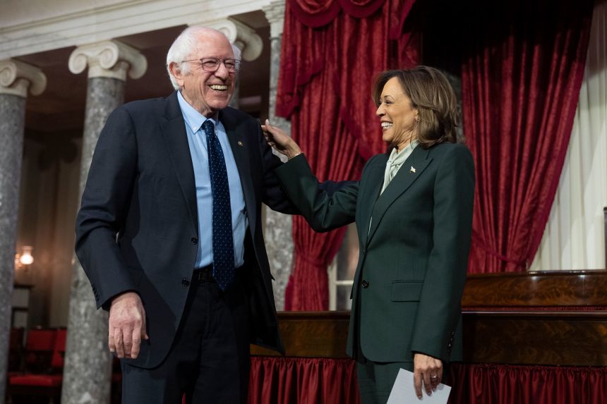 Sen. Bernie Sanders talks to Vice President Kamala Harris during a ceremony in the Old Senate Chamber at the US Capitol, in January.