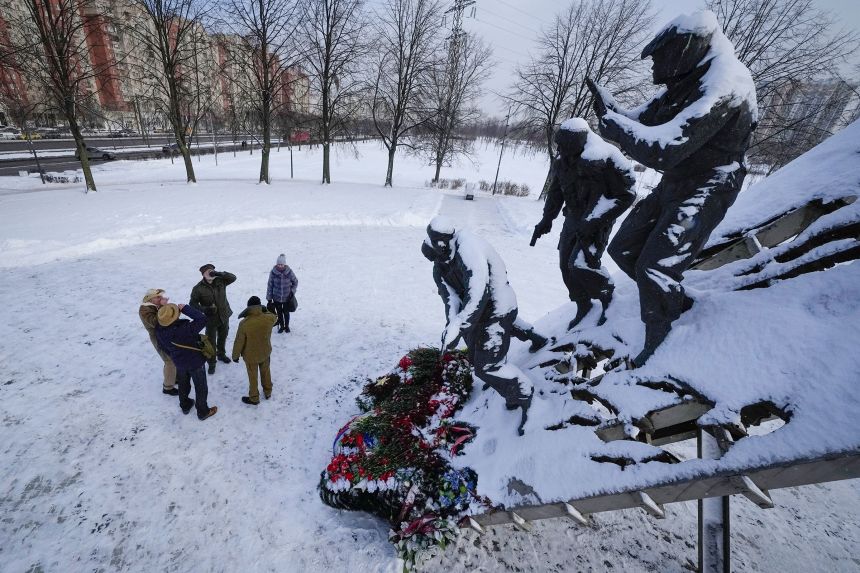 Veterans of the 10-year Soviet war in Afghanistan drink vodka in remembrance of their killed friends, after a memorial ceremony marking 36 year anniversary of withdrawal of Soviet troops from Afghanistan, in St. Petersburg on February 15.