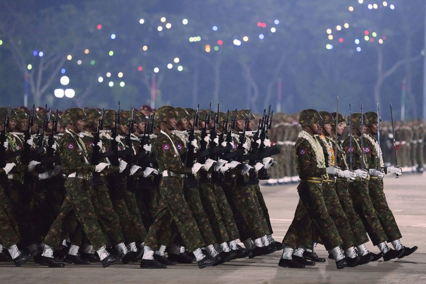 Military officers march during a parade to commemorate Myanmar's 80th Armed Forces Day in Naypyidaw, Myanmar, on March 27, 2025.