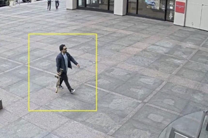 This image from surveillance video obtained by The Associated Press shows Shane Tamura outside a Manhattan office building on Monday, July 28 in New York.