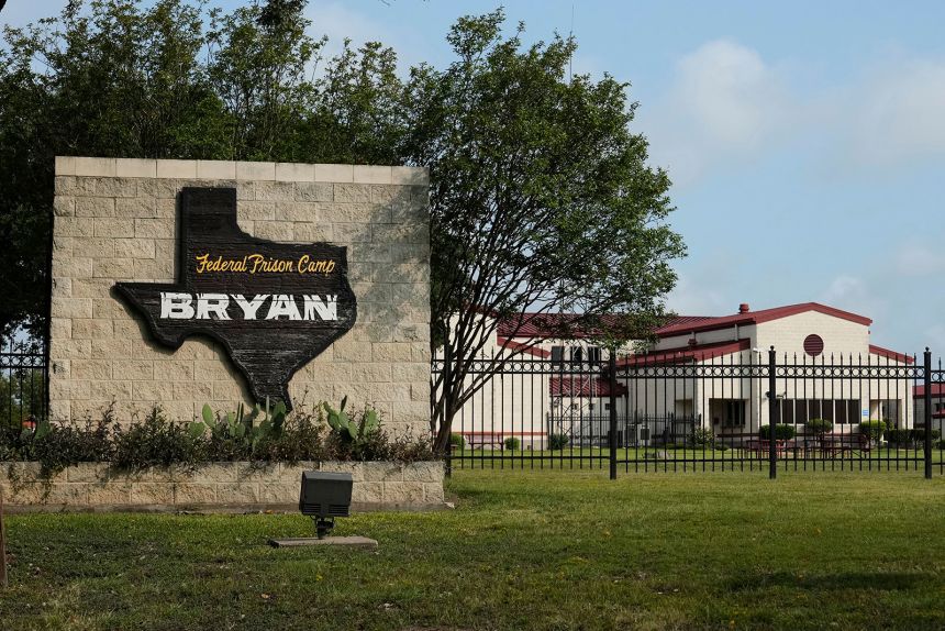 The main entrance to Federal Prison Camp, Bryan on Thursday, Aug. 7, 2025, in Bryan, Texas. (AP Photo/Ashley Landis)