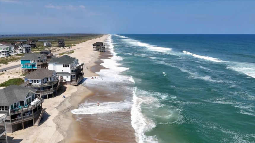 Homes along the Atlantic Coast in Dare County, North Carolina, are seen on Monday, ahead of expected impacts from Hurricane Erin.