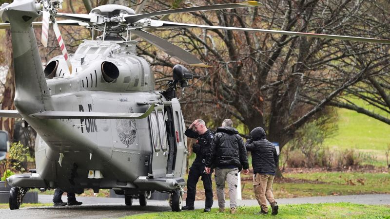 Manhunt underway in rugged Australian bush after gunman kills two policemen