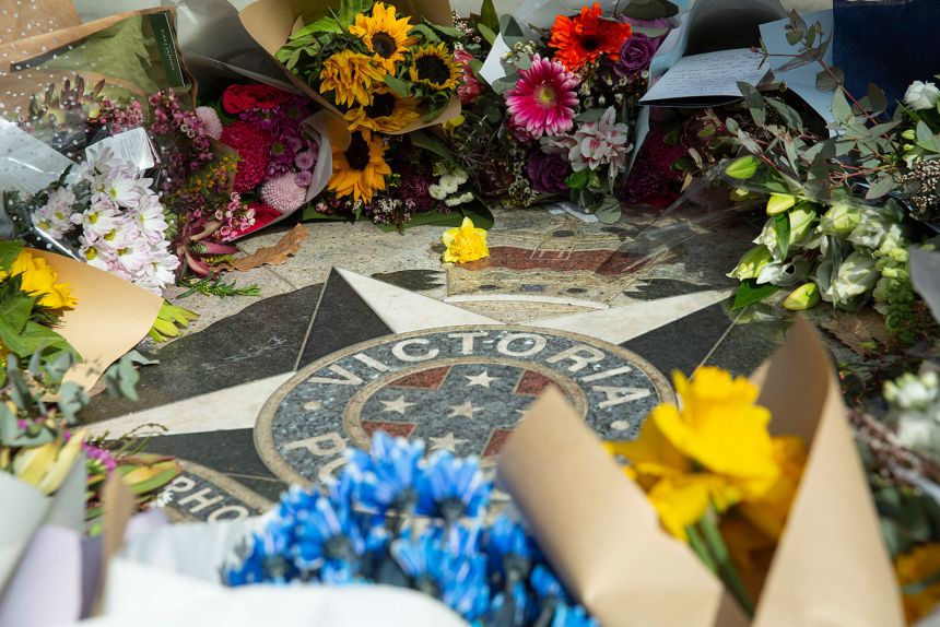 Flowers laid in tribute to the two Victoria Police officers killed at a remote property on Tuesday, Aug. 26.
