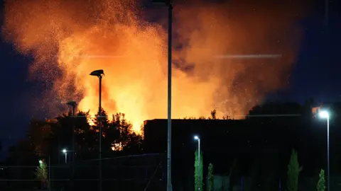 EPA Flames rise from Woolton Hall in Liverpool, Britain, 19 August 2025.