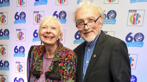 Getty Images Biddy Baxter and her former colleague Edward Barnes attending Blue Peter's 60th birthday in 2018