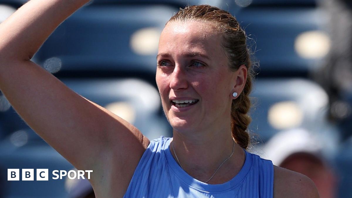 Petra Kvitova waves to the crowd at the US Open following her first-round defeat