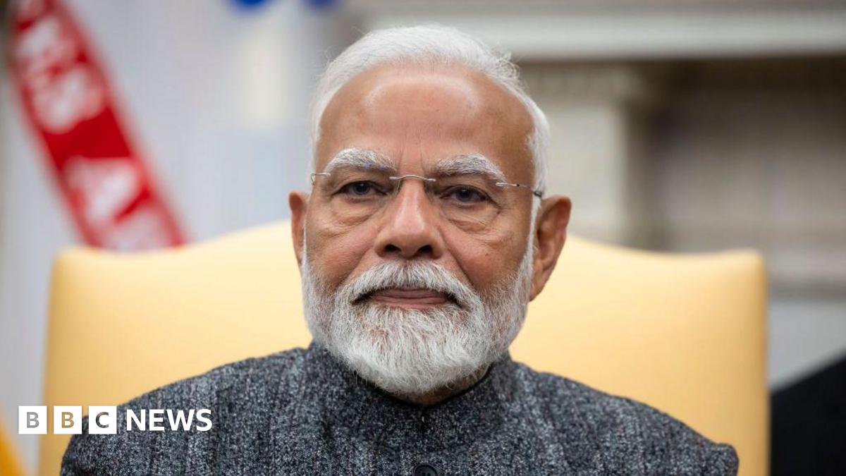 Narendra Modi, India's prime minister, during a meeting with US President Donald Trump, not pictured, in the Oval Office of the White House in Washington, DC, US, on Thursday, Feb. 13, 2025.