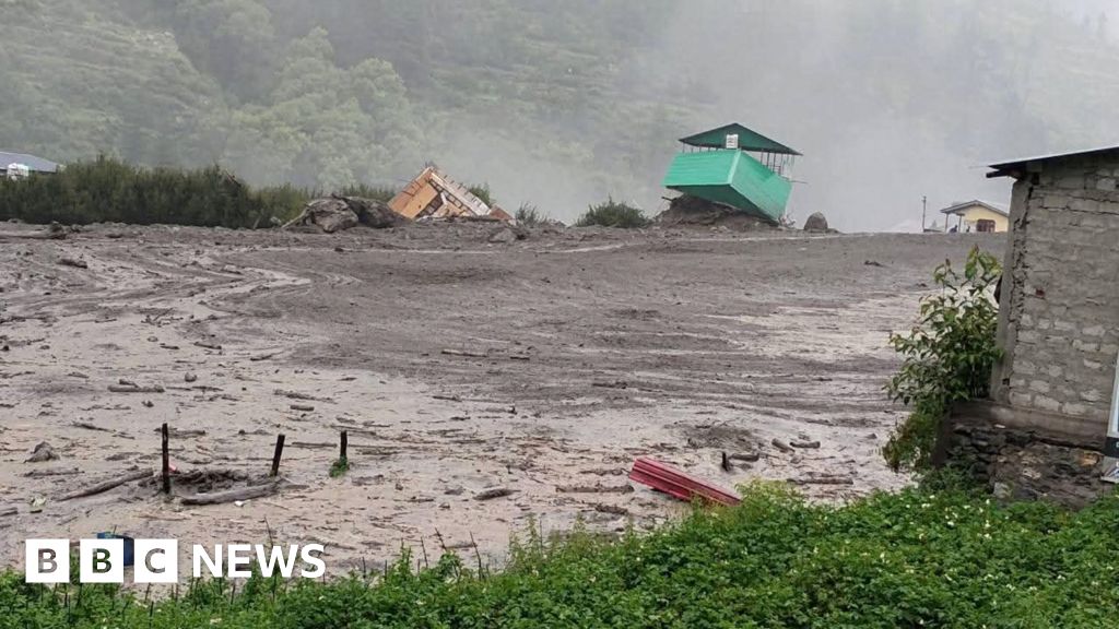 More than 100 people missing after flash floods hit village
