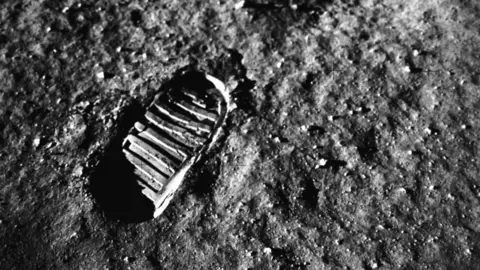NASA Black and white photograph of an astronaut’s footprint in the lunar soil taken during the Apollo 11 mission