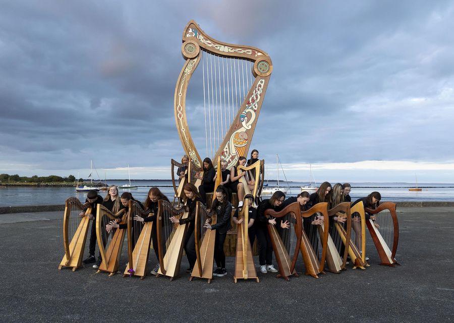 Free to use 1/8/2025
Wexford ready for the Fleadh, local harpists photographed at the newly installed Fleadh harp on Wexford Quay. Photo; Mary Browne