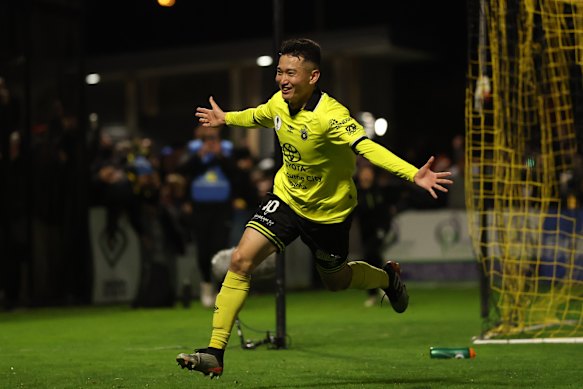 Asahi Yokokawa of Heidelberg United FC celebrates after scoring a goal.