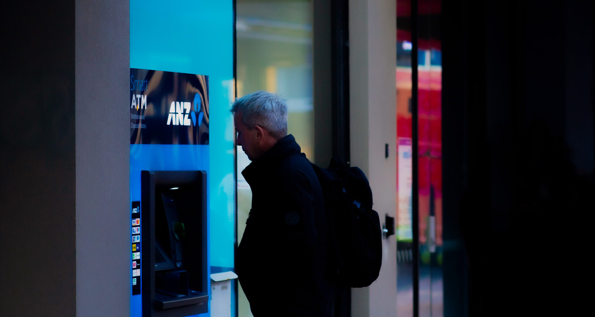 Man at an ANZ ATM machine