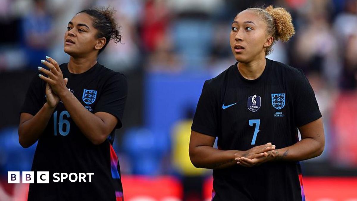Jess Carter and Lauren James clapping the fans after an England game