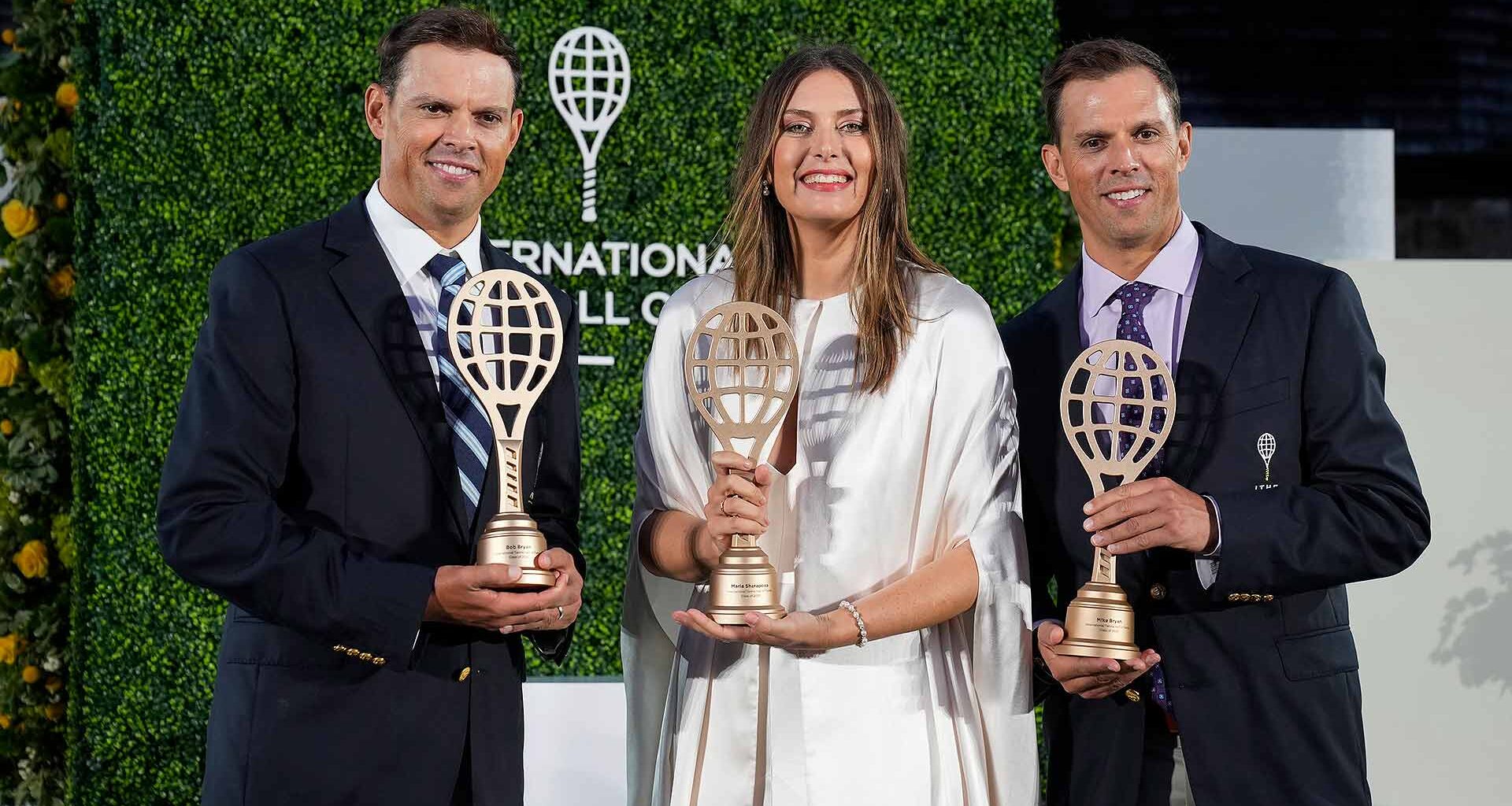 Bob (left) and Mike Bryan flank fellow Hall of Fame inductee Maria Sharapova on Saturday night in Newport.