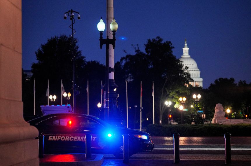 A law enforcement vehicle stands in front of Union Station near the US Capitol in Washington, DC, on Monday.