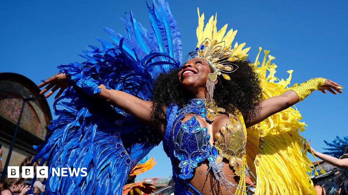 Notting Hill Carnival parade dances through west London
