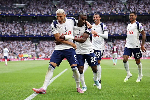 Richarlison of Tottenham Hotspur celebrates scoring with Mohammed Kudus.