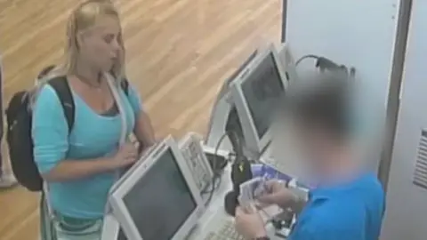 Police handout Betro is wearing a blue top with light-coloured trousers on. She has a rucksack on her back. She has blonde hair with one side partially pulled back.