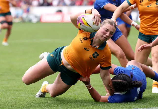 Caitlyn Halse crashes over for Australia against Samoa at the Rugby World Cup.