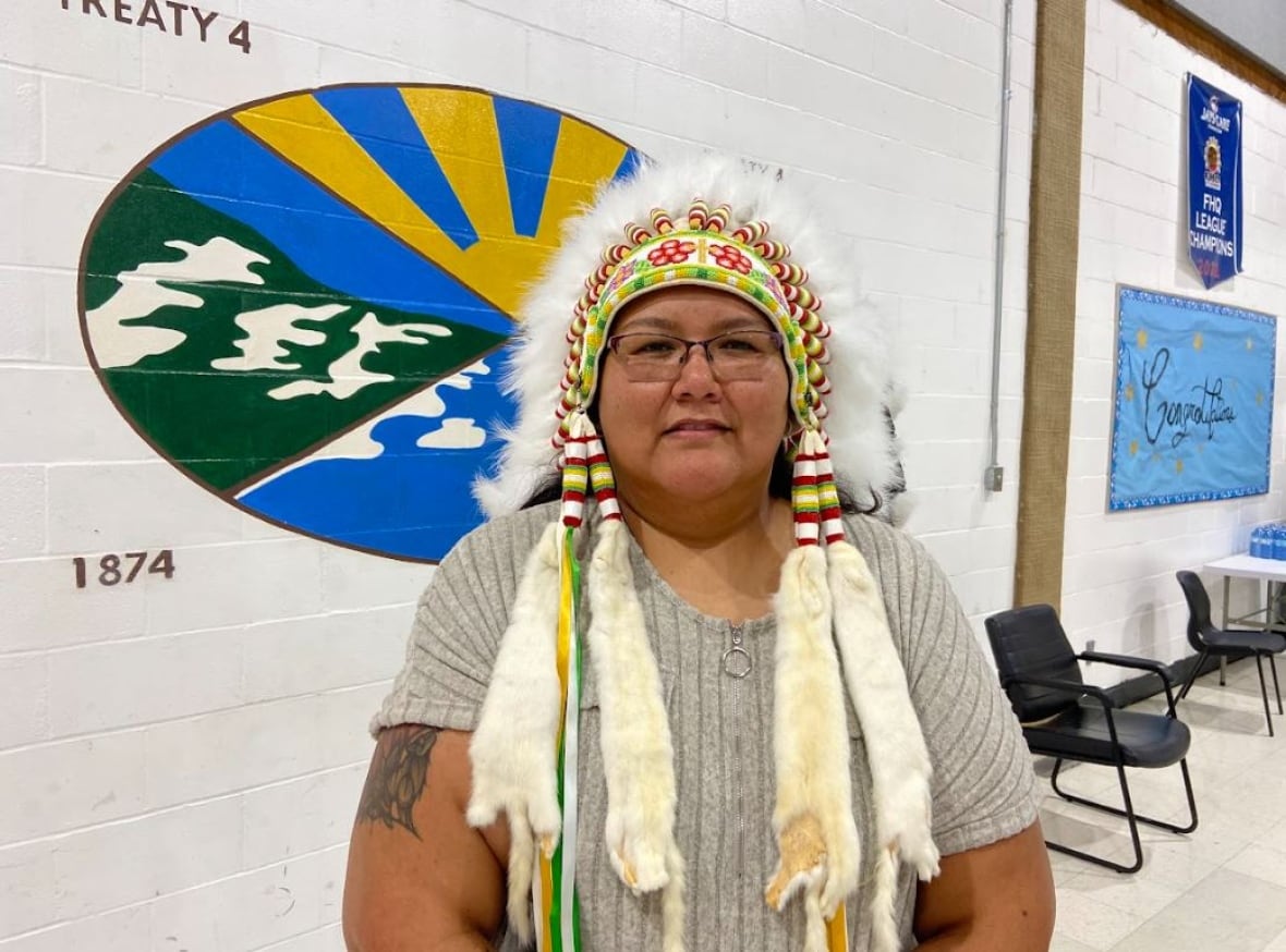 Chief Melissa Tavita being photographed