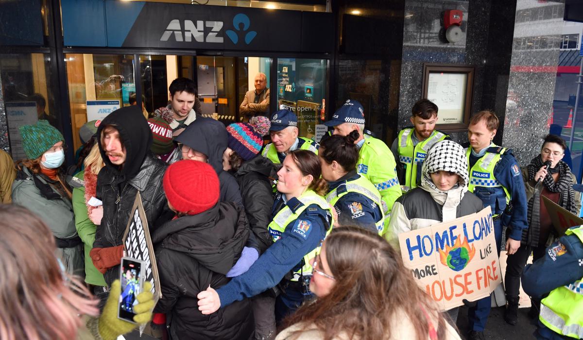 Customer tumbles at bank protest