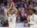 Bayern's Thomas Muller greets supporters during a match in May.